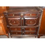 Jacobean style oak chest of four full width graduated geometrically moulded drawers and plain