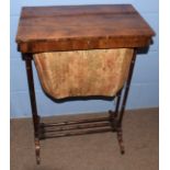 Early 19th Century rosewood sewing table, having a pull out fabric holder under a plain