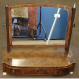 Early 19th century mahogany toilet mirror with ivory finials and similar ball feet, bowed base