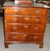 Early 18th century style walnut chest cross banded top over two short and three full width graduated