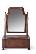 19th century mahogany toilet mirror, arched mirror back and single drawer base raised on ball