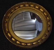 Regency gilt and gesso convex circular wall mirror