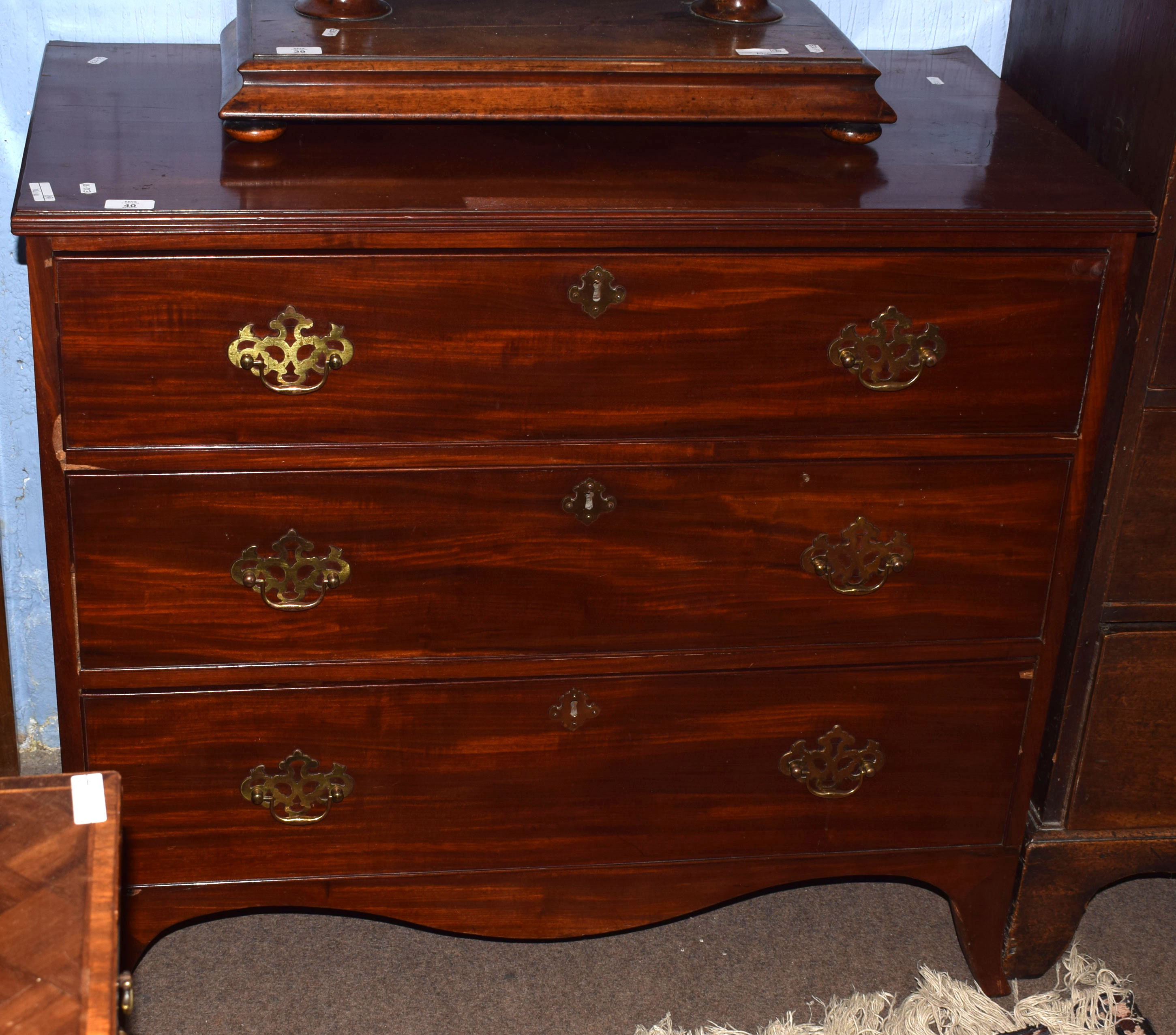 Mahogany chest of three full width graduated drawers on splayed feet, 94cm wide