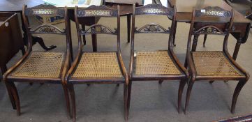 Set of four Regency period brass inlaid cane seated dining chairs