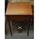 Mahogany work table lifting lid over two dummy drawers and further drawer below on ring turned