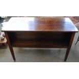 Late 19th/early 20th century mahogany double sided bookcase of rectangular form with tapering fluted