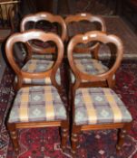 Set of four Victorian mahogany balloon back dining chairs