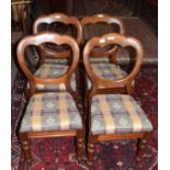 Set of four Victorian mahogany balloon back dining chairs