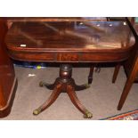 Regency period mahogany tea table with fold top, over balustered support terminating in a
