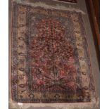 Small Caucasian rug, multi-gull border, central tree of life design with birds etc, mainly puce