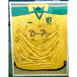 NORWICH CITY FC SHIRT 2002 Centenary, signed by 22 members of the squad, framed and glazed