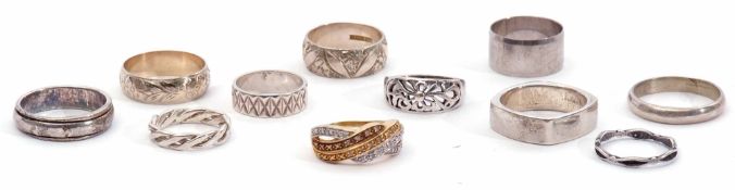 Mixed Lot: eight white metal rings together with one other metal example, gross weight 42.6gms