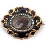 Victorian mourning brooch, the glaze centre with lock of hair, small seed pearls and a gold