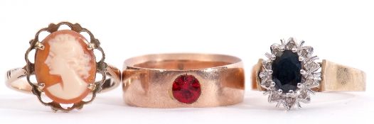 Mixed Lot: 9ct gold wide band ring set with a red stone, a 9ct stamped cameo ring, together with a