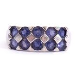 9ct white gold Iolite set ring, a chequerboard design in part rub over setting, all in a castellated