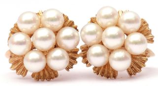 Pair of 14K stamped cluster cultured pearl earrings set in a flowerhead design, screw fittings,
