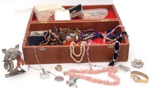 Large wooden box of costume jewellery to include necklaces, brooch etc