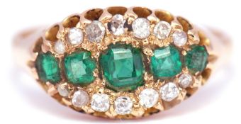Emerald and diamond ring, the central row set with 5 graduated square cut emeralds between 2 rows of