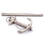 Mixed Lot: antique white metal large anchor brooch, together with an elongated paste set brooch (2)