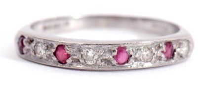 18ct white gold ruby and diamond half eternity ring, alternate set with 4 found faceted round rubies