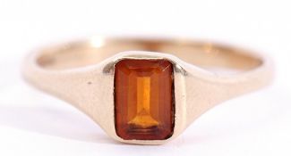 9ct gold citrine ring, the emerald cut dark citrine in a rub-over square profile shank, London,