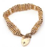 Antique 15ct stamped five-bar gate bracelet, heart padlock and safety chain fitting, weight 20gms