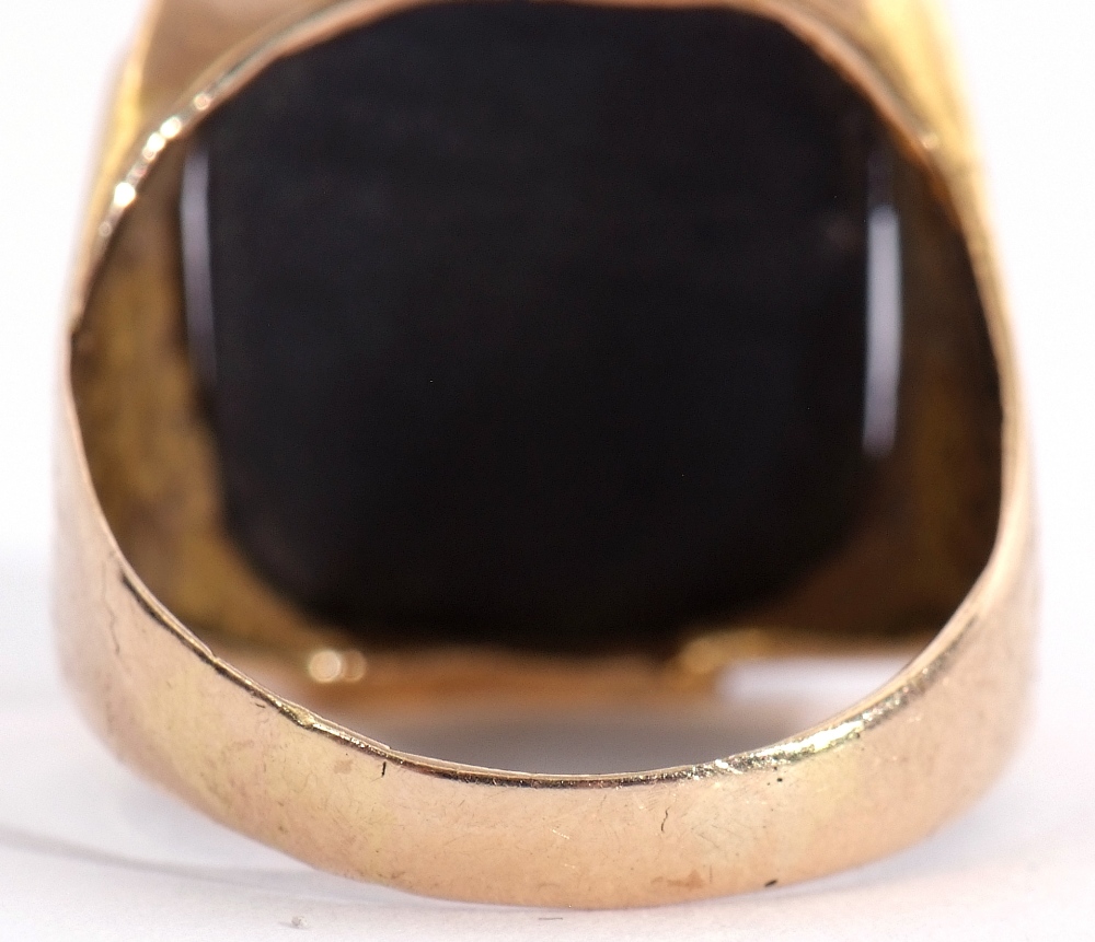 Mid-grade yellow metal and haematite signet ring, the rectangular shaped panel 18 x 9mm, raised - Image 7 of 10