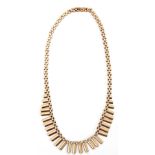 9ct gold "Cleopatra" fringe necklace, three rows of graduated brick links, fully articulated to a