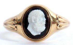 Antique carved hard stone ring, a head and shoulders carved figure of a bearded man applied to an