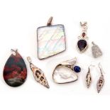 Mixed Lot: modern pendants including, all in 925 stamped mounts, an iridescent glass example, an