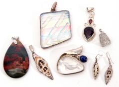 Mixed Lot: modern pendants including, all in 925 stamped mounts, an iridescent glass example, an
