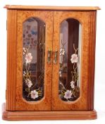 Mixed Lot: simulated walnut miniature glazed cabinet jewellery box to include pendants, necklaces,