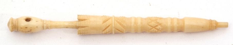 Antique ivory Stanhope needle case in the form of a furled umbrella, 10.5cm long