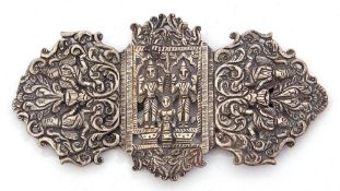 Antique cast metal large buckle, a pierced design with figures and scrolls, 14.5 x 7.5cm