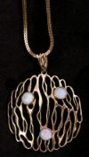 Large 9ct gold stylised open work pendant featuring 3 round cabochon opals in bezel mounts, open
