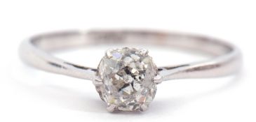 Single stone diamond ring, an old cut diamond set in a six-claws to a pierced heart coronet style