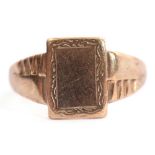 9ct gold signet ring, the rectangular plain polished panel framed with a chased border and part