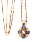 Modern 9ct gold diamond and sapphire cluster pendant, suspended from a 9ct gold curb link chain,