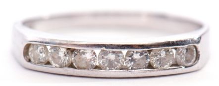 18ct white gold diamond set half eternity ring, channel set with 7 round brilliant cut diamonds, 0.