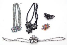 Two Butler & Wilson pink boxes to include multi-coloured large turtle brooch, floral necklaces and