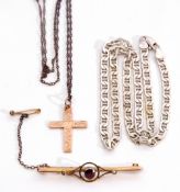 Mixed Lot: 9ct stamped cross, chase detail on a metal chain; a 9ct stamped brooch centring a