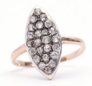 Precious metal and diamond marquis ring, set throughout with 24 small old cut diamonds, panel size
