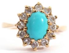 Modern turquoise and paste set cluster ring, the oval shaped cabochon turquoise within a surround of