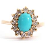 Modern turquoise and paste set cluster ring, the oval shaped cabochon turquoise within a surround of