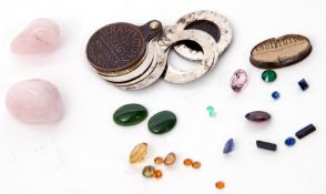 Small quantity of loose gem stones to include a synthetic sapphire, a natural peridot, two oval