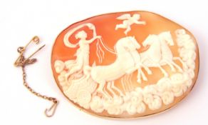 Large Victorian carved shell cameo of oval form, deeply carved and depicting Helios chasing the