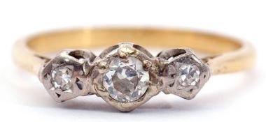 Precious metal three stone diamond ring featuring 3 graduated diamonds, each in an illusion setting,