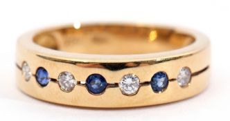 Sapphire and diamond ring, 750 stamped, the plain polished band alternate set with 4 brilliant cut