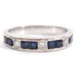 Precious metal, sapphire and diamond set half eternity ring (part hoop), comprising 4 groups of 2