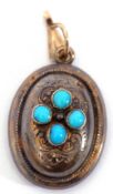 Antique small gilt metal oval locket, the centre applied with 4 collet set small turquoises, the